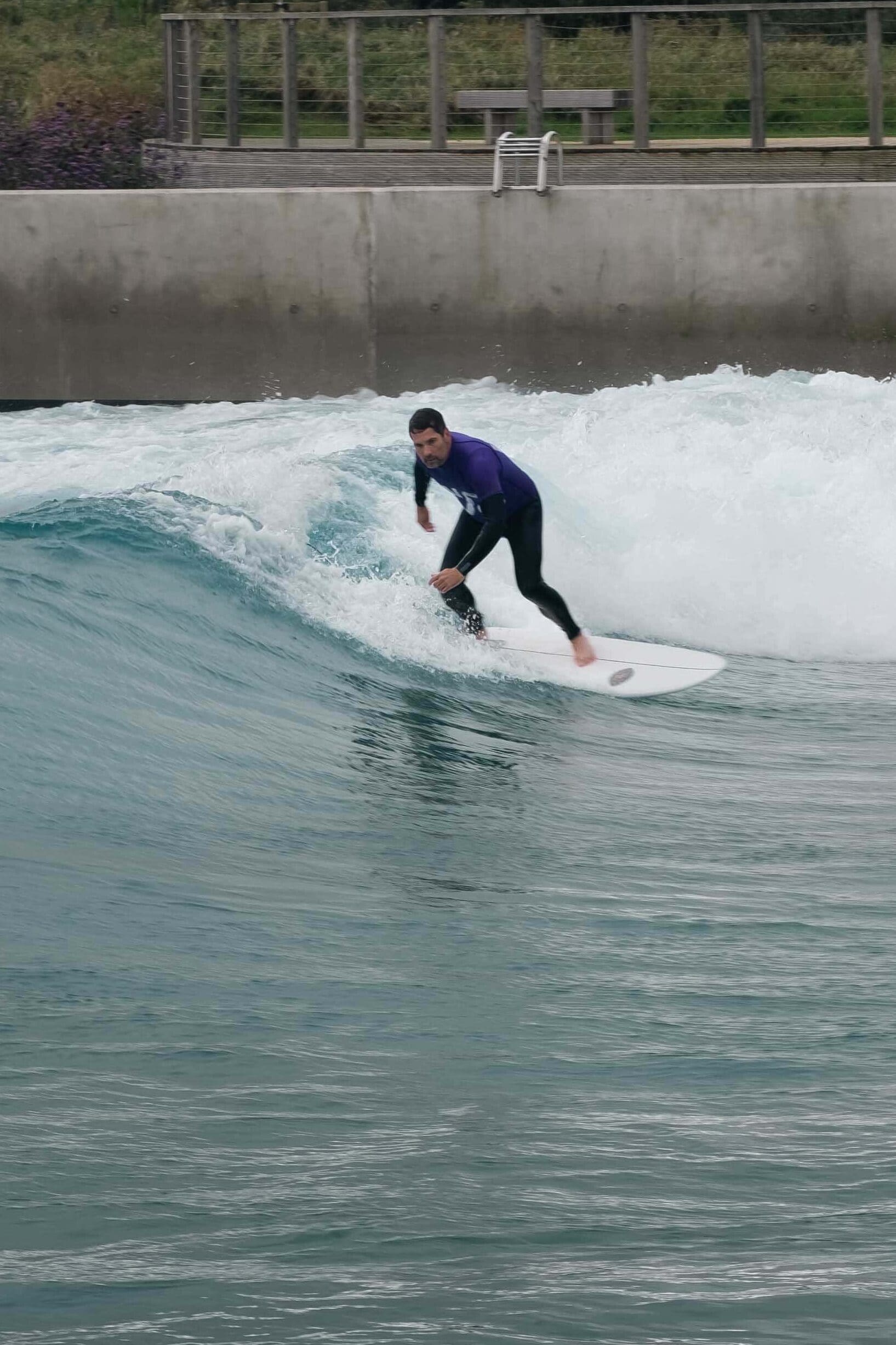 A surfer on a wave at The Wave
